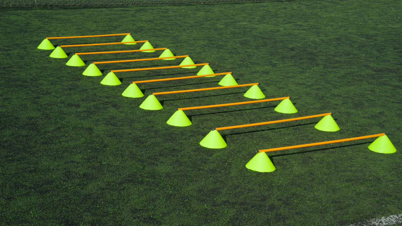Training ladders and cones laid out on an astro pitch